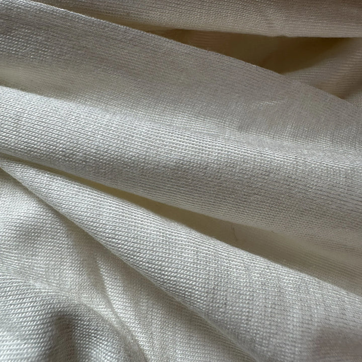 Eco-friendly aloe vera knitted single jersey fabric ideal for comfortable, breathable, and sustainable clothing.