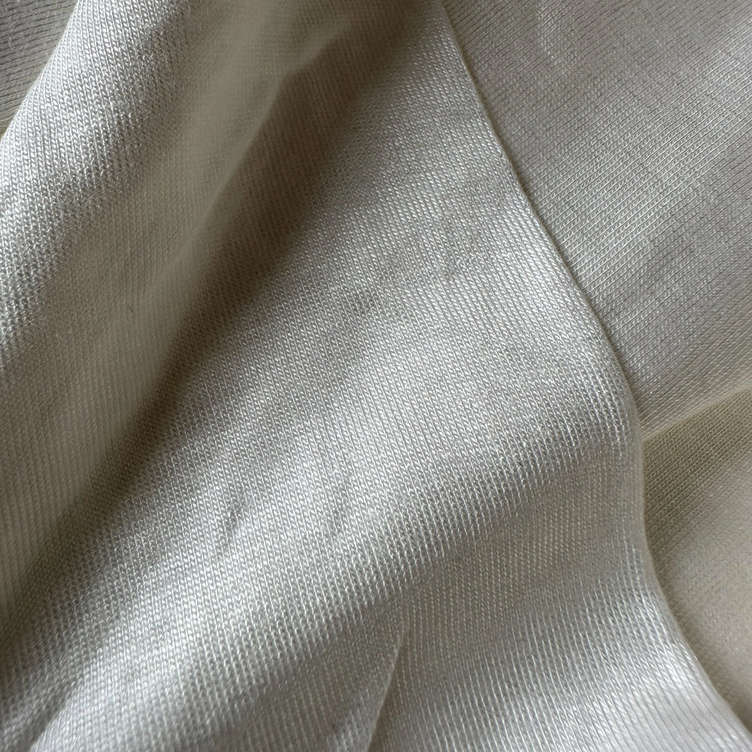 100% aloe vera knitted single jersey fabric with soft texture, breathable feel, and smooth eco-friendly finish.