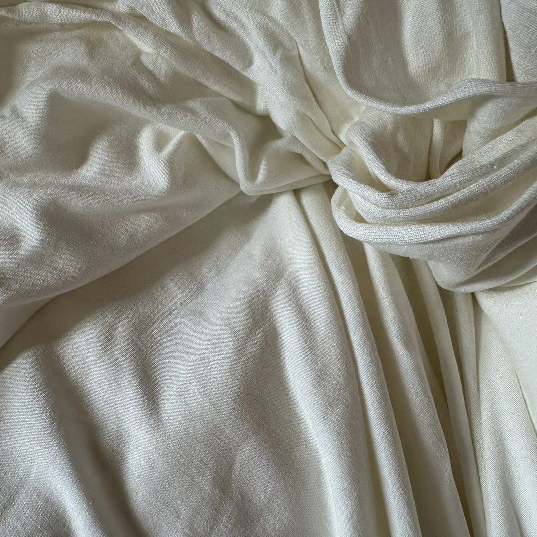 Lightweight and eco-friendly 95% milk 5% lycra knitted fabric – ideal for dresses, tops, and activewear