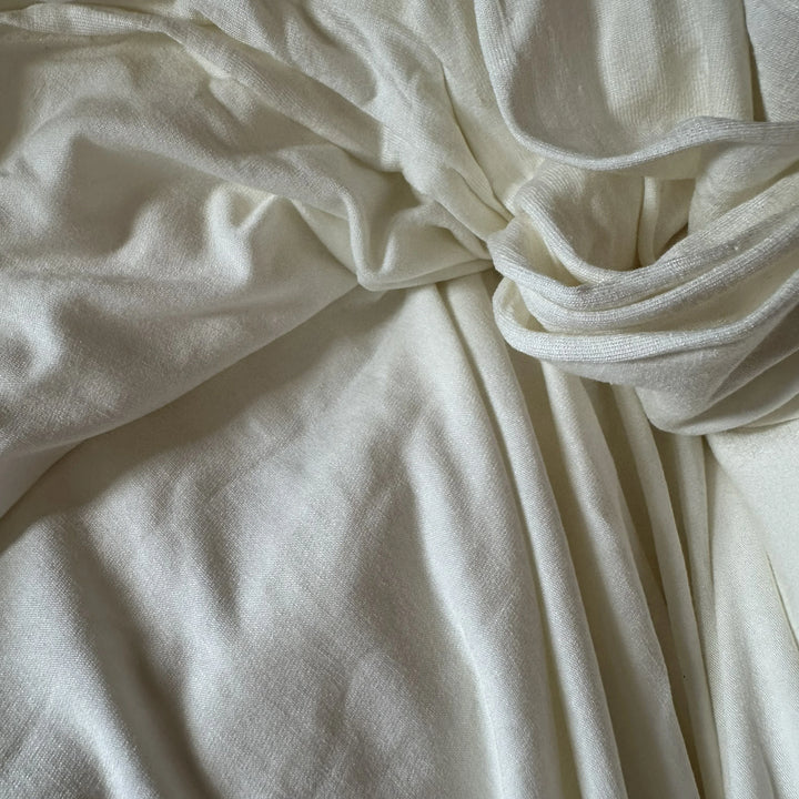 Lightweight and eco-friendly 95% milk 5% lycra knitted fabric – ideal for dresses, tops, and activewear