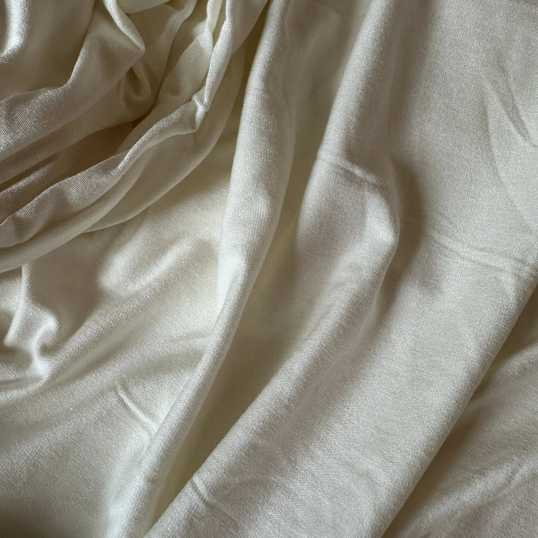 Premium 95% milk protein 5% lycra knitted fabric – ideal for activewear and dresses