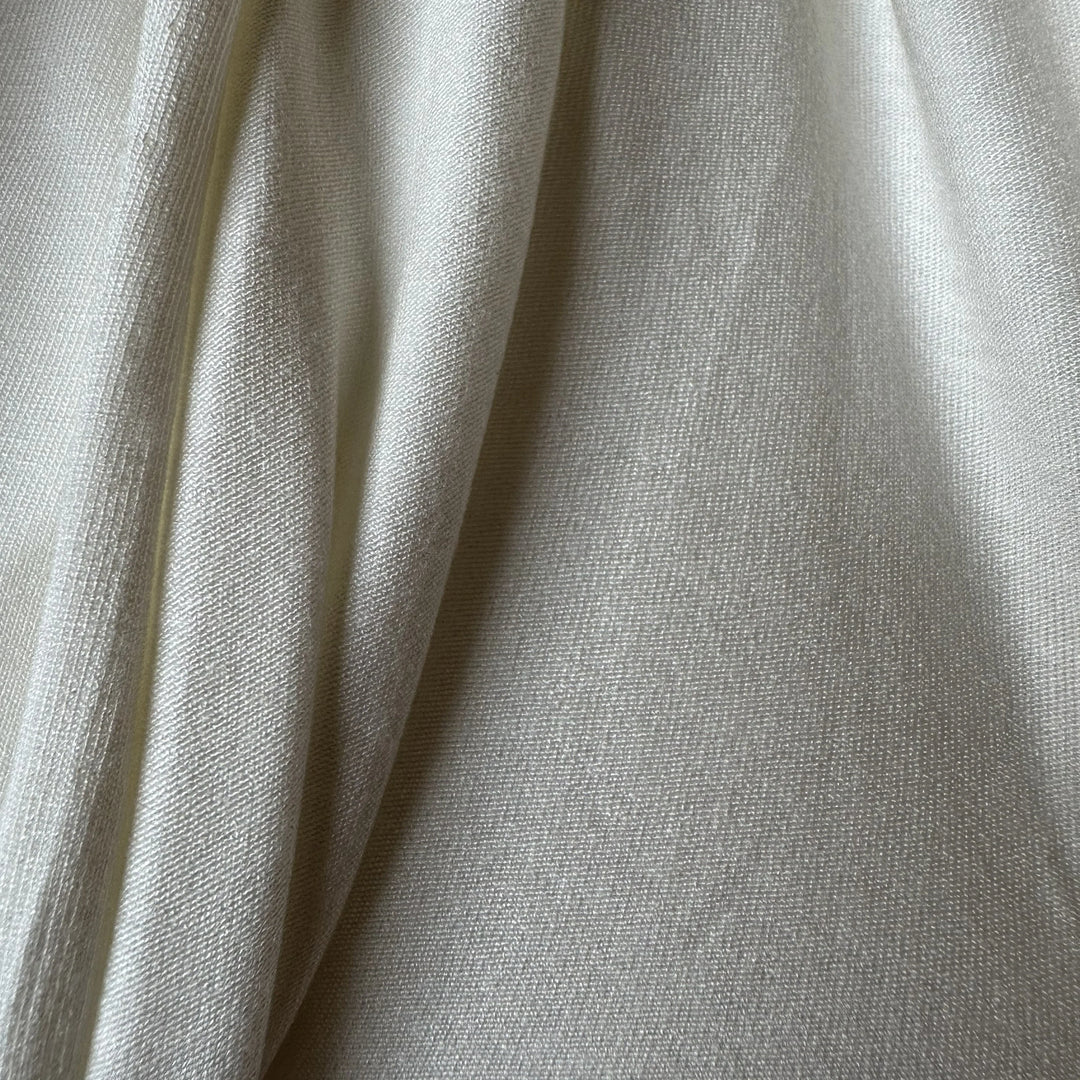 Organic rose petal fabric offering smooth touch, perfect for dresses, scarves, and lingerie.