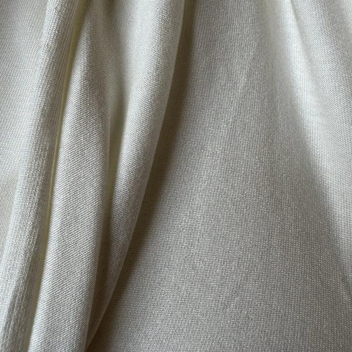 Organic rose petal fabric offering smooth touch, perfect for dresses, scarves, and lingerie.