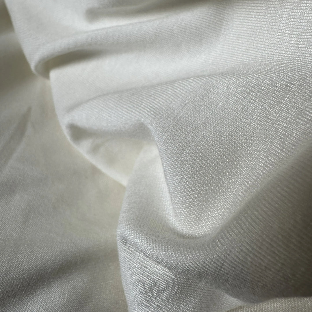 Biodegradable rose fiber fabric crafted for sustainable fashion and eco-luxury clothing.